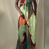 sage green printed open back halter maxi dress