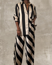 black and tan striped satin wide leg pant set with matching oversized button up shirt