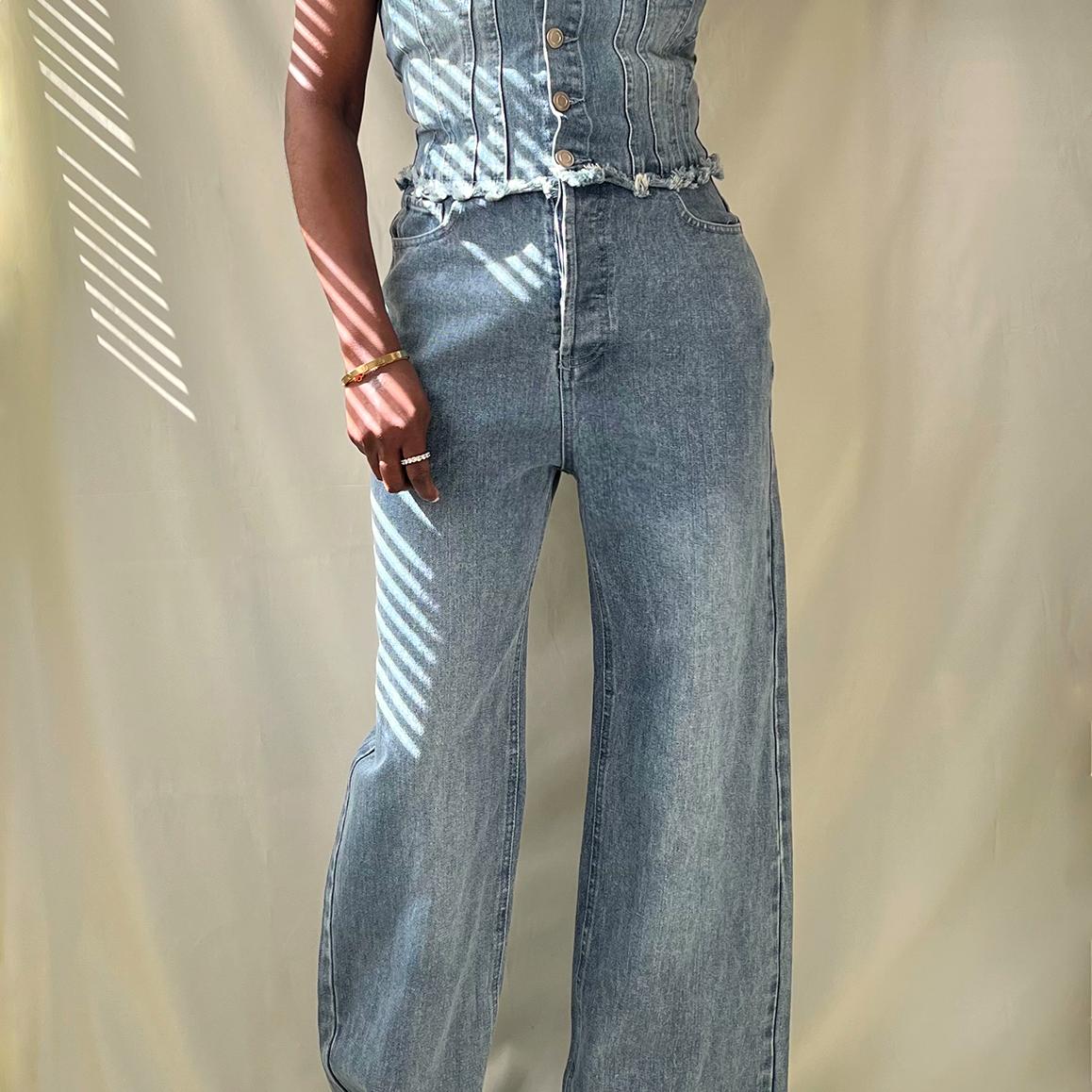 blue denim strapless button up wide leg jumpsuit